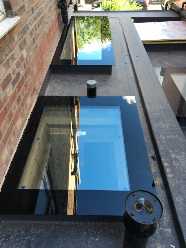 Multiple flat roof skylights on extension in High Wycombe