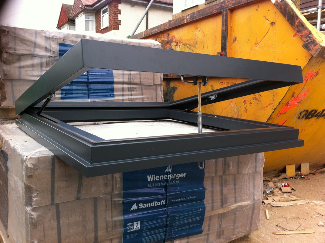 Opening flat roof skylight in anthracite grey installed in High Wycombe