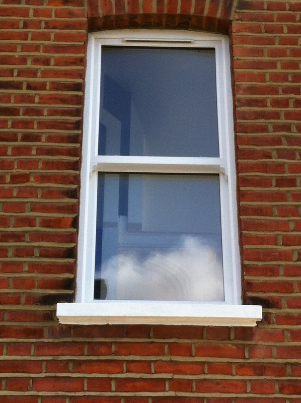uPVC sash window on Victorian red brick house in High Wycombe